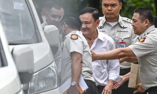 Thai top court orders ex-PM Thaksin jailed for one year